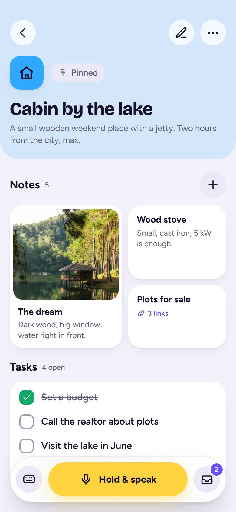 The idea Cabin by the lake with photo notes and a task list